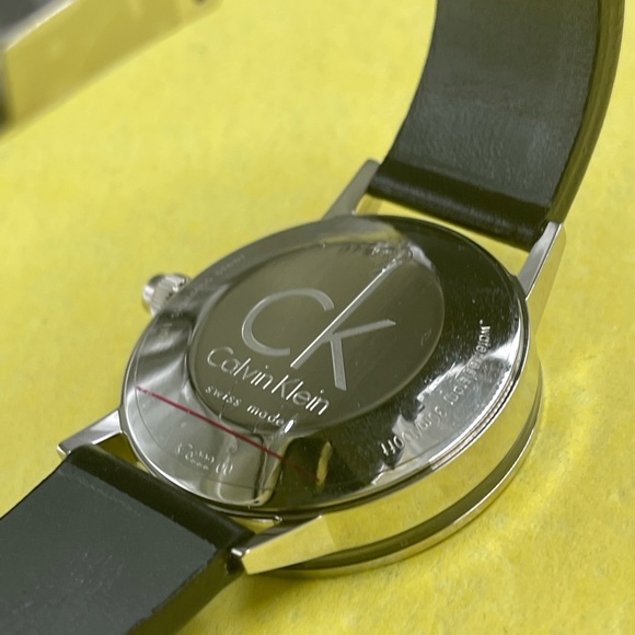Calvin Klein Post Minimal Gold  Dial Black Leather Strap Watch For Men - K7621501